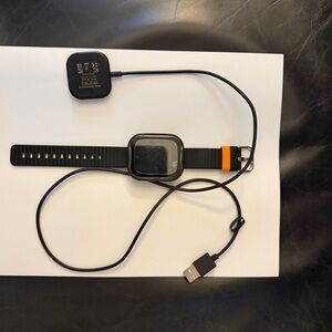 Smartwatch with Black Strap and Charger